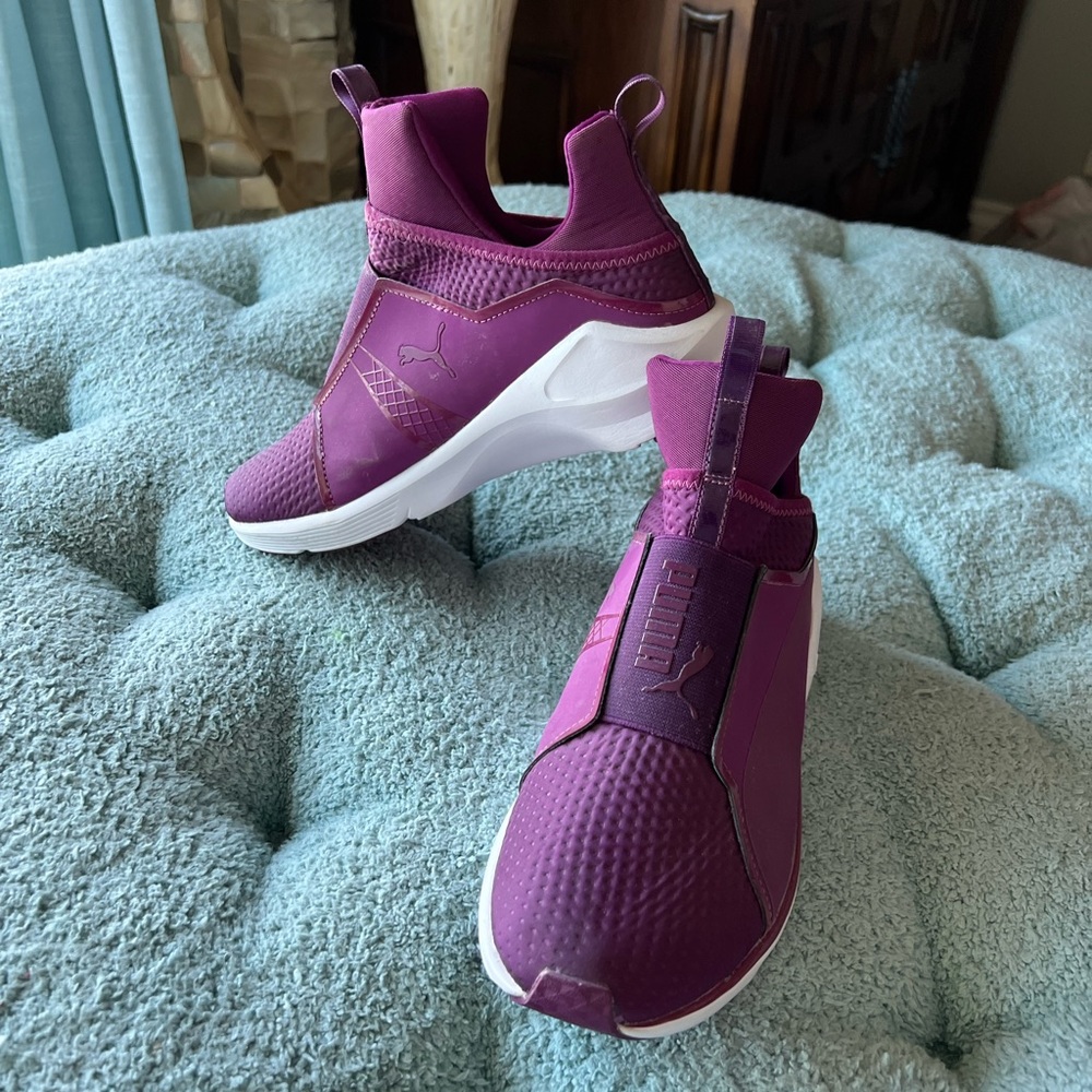 Puma pull on sneakers tennis shoes.  NWT. Size 9. Tried on. Never worn outside.
